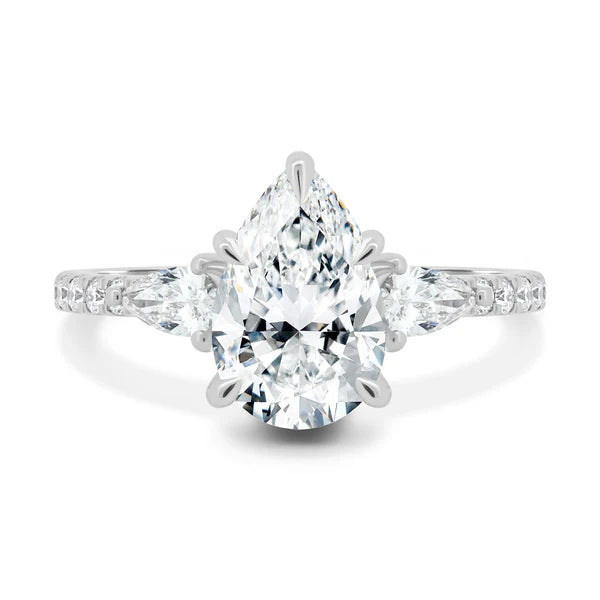 Solitaire Pear Side Stones Pavé