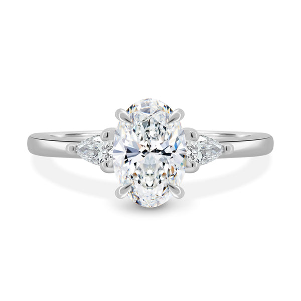 High Setting Solitaire Pear Side Stones
